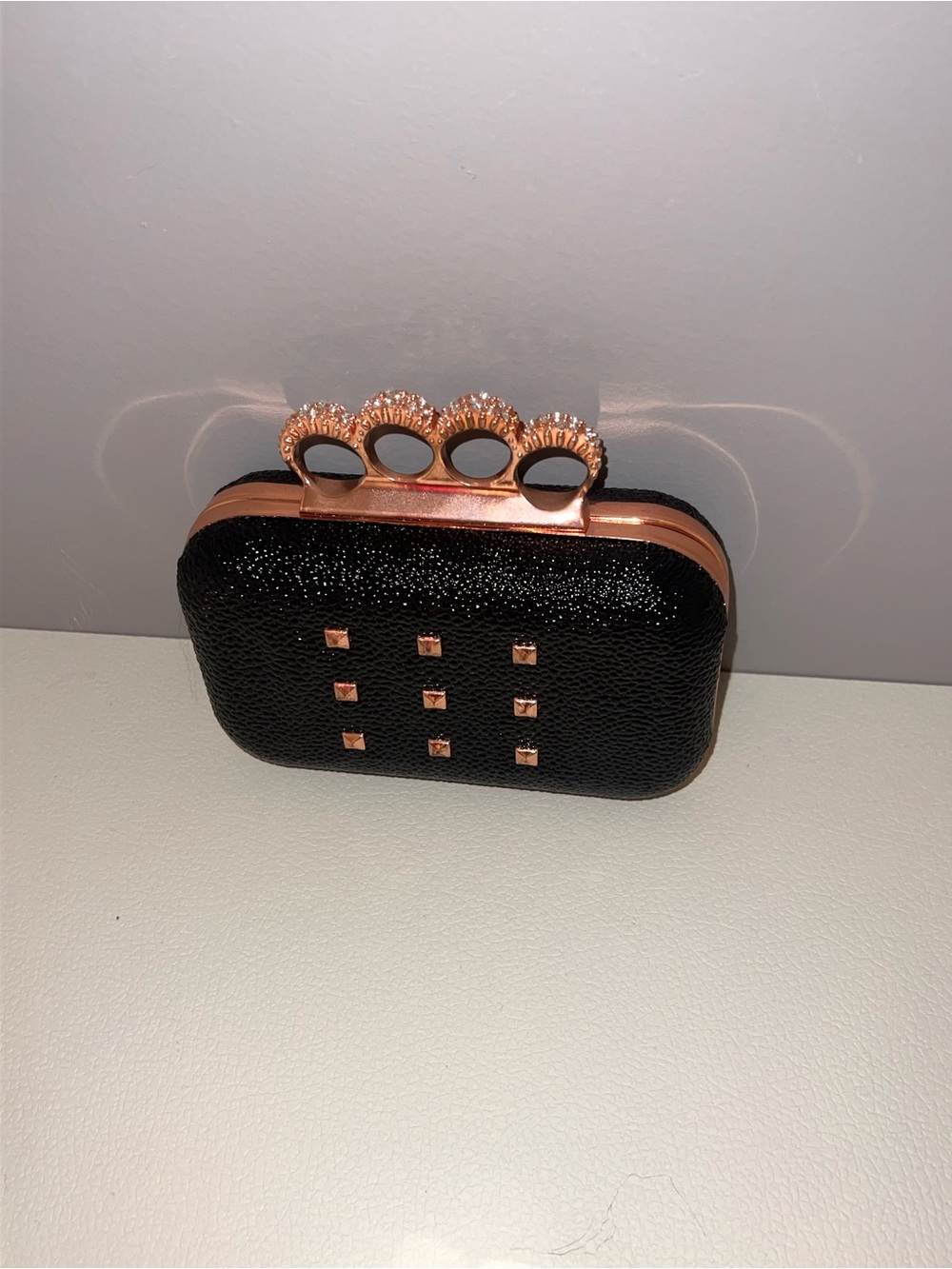 Black and Rose Gold Knuckle Clutch Bag